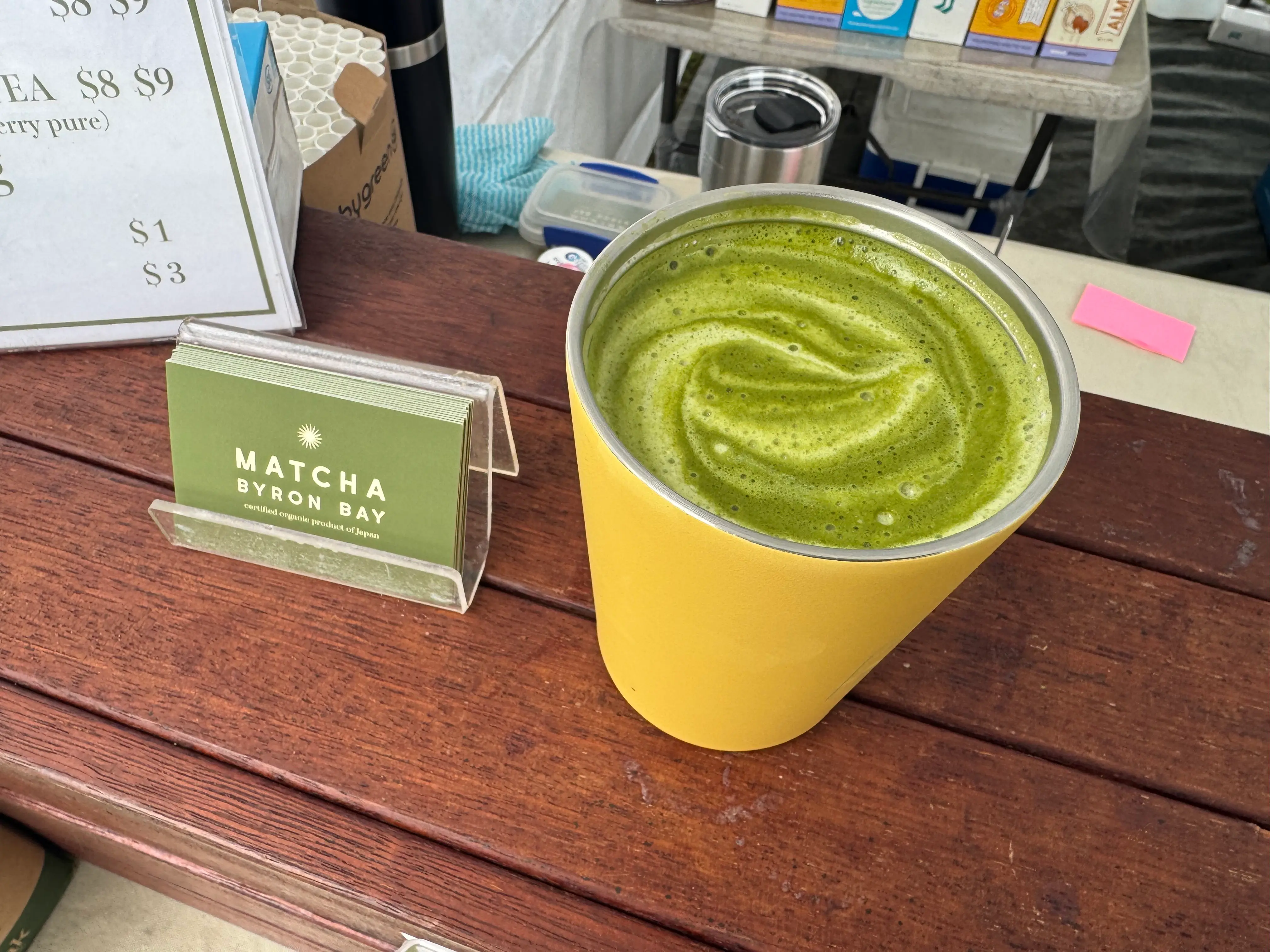 A hot matcha from Matcha Byron served in a reusable bring-your-own cup