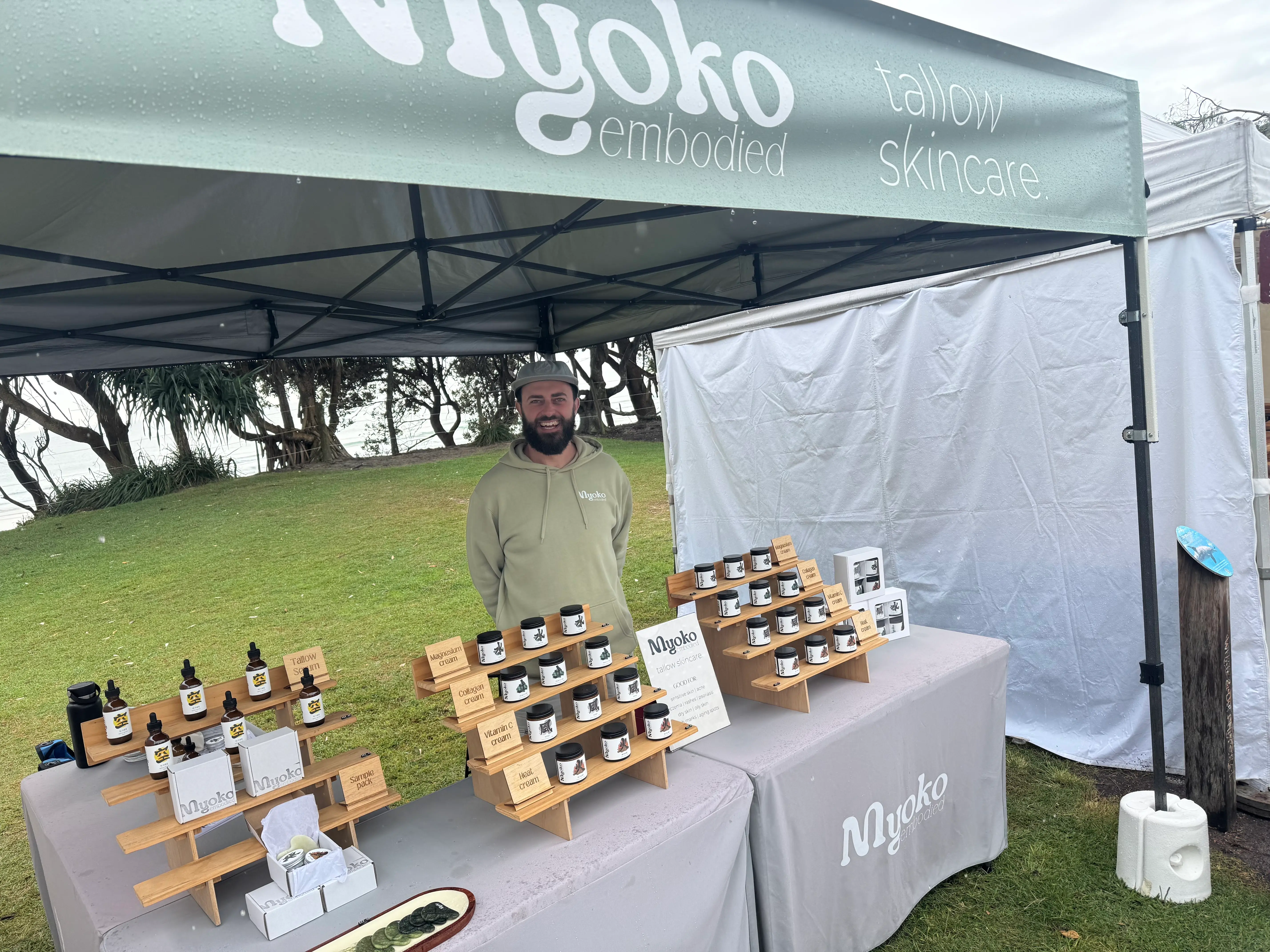 Myoko Embodied market display with skincare products and natural styling