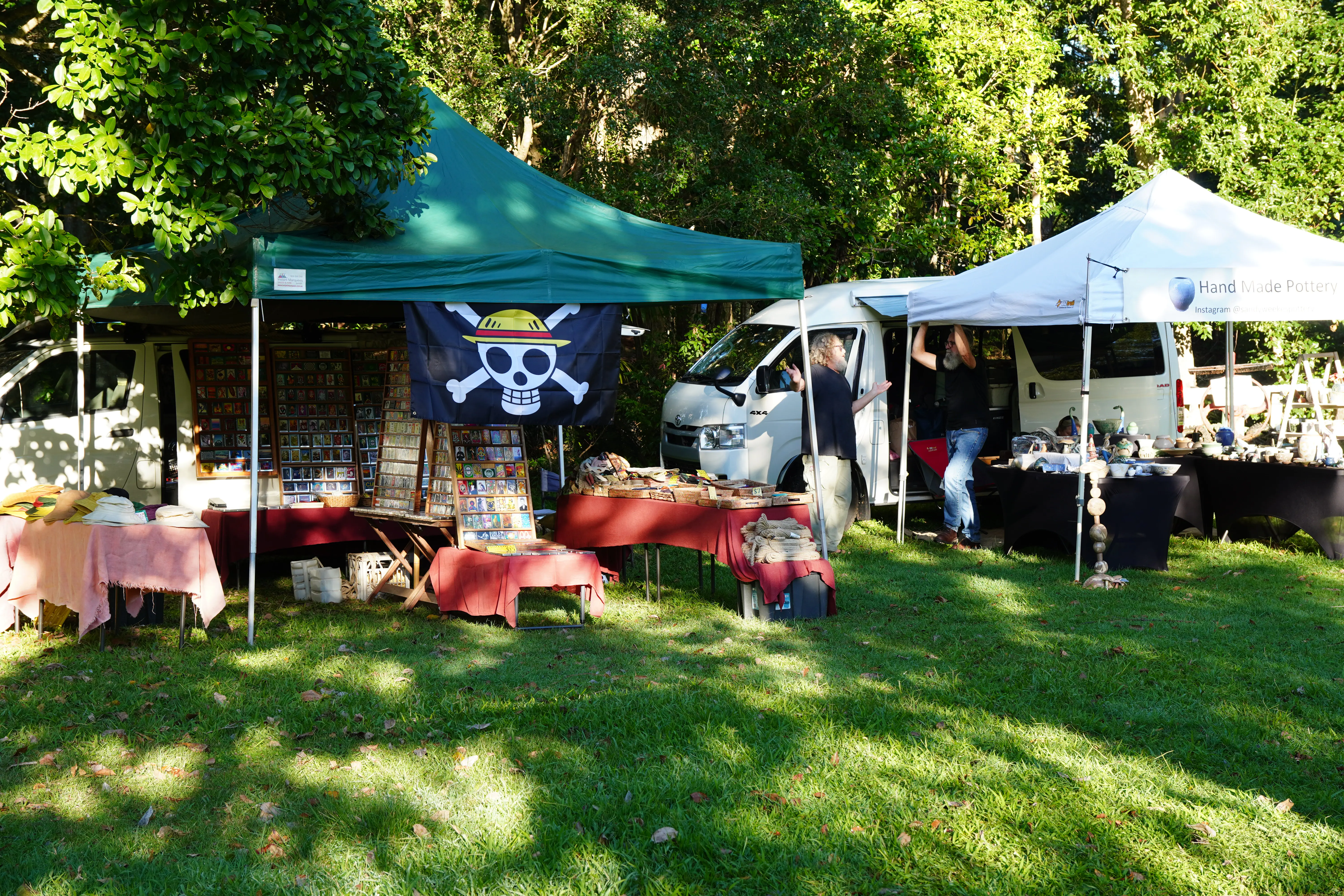 Open grass and market stalls at Brunswick Valley Historical Park during Mullumbimby Community Markets